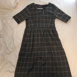 Never been worn Roolee midi dress size large